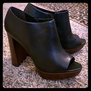 Vince Camuto heeled booties.